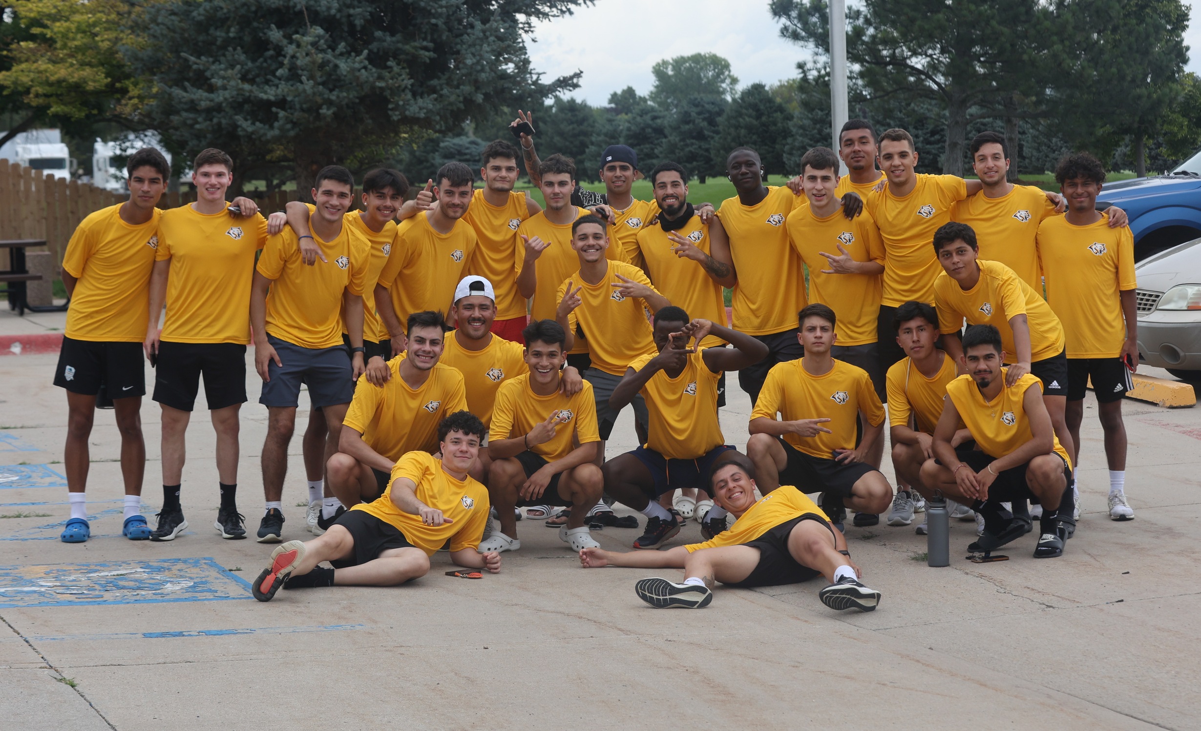 The WNCC men's soccer team pose for a picture after an afternoon workout.