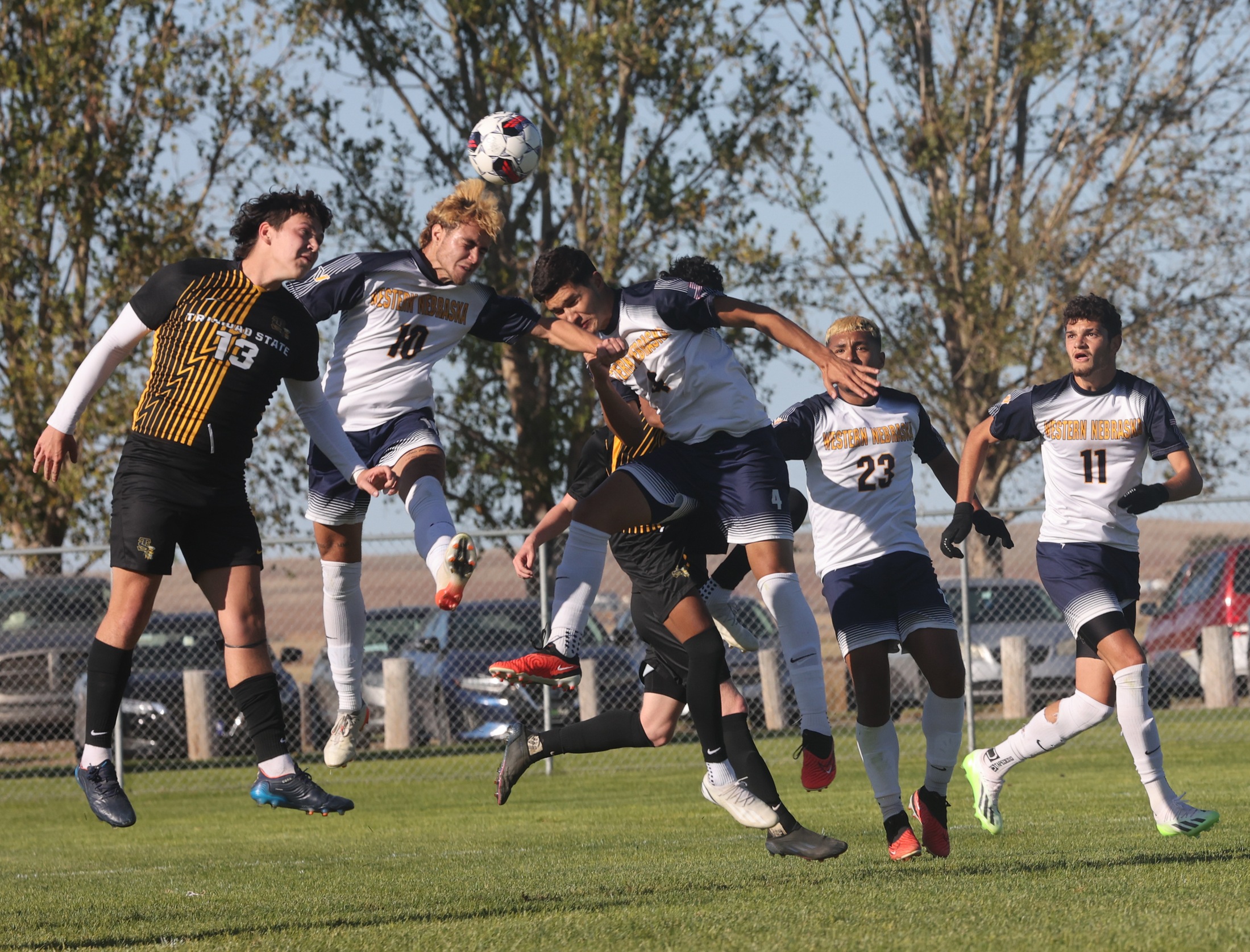 Header action in the Trinidad State match.