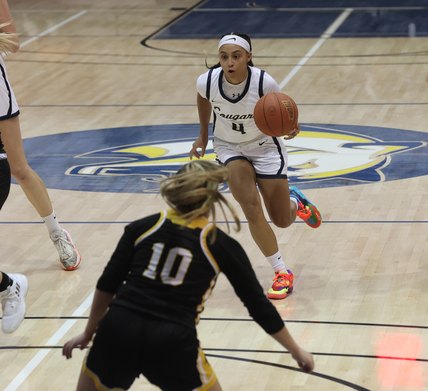 Jayla Owen brings the ball up the court.