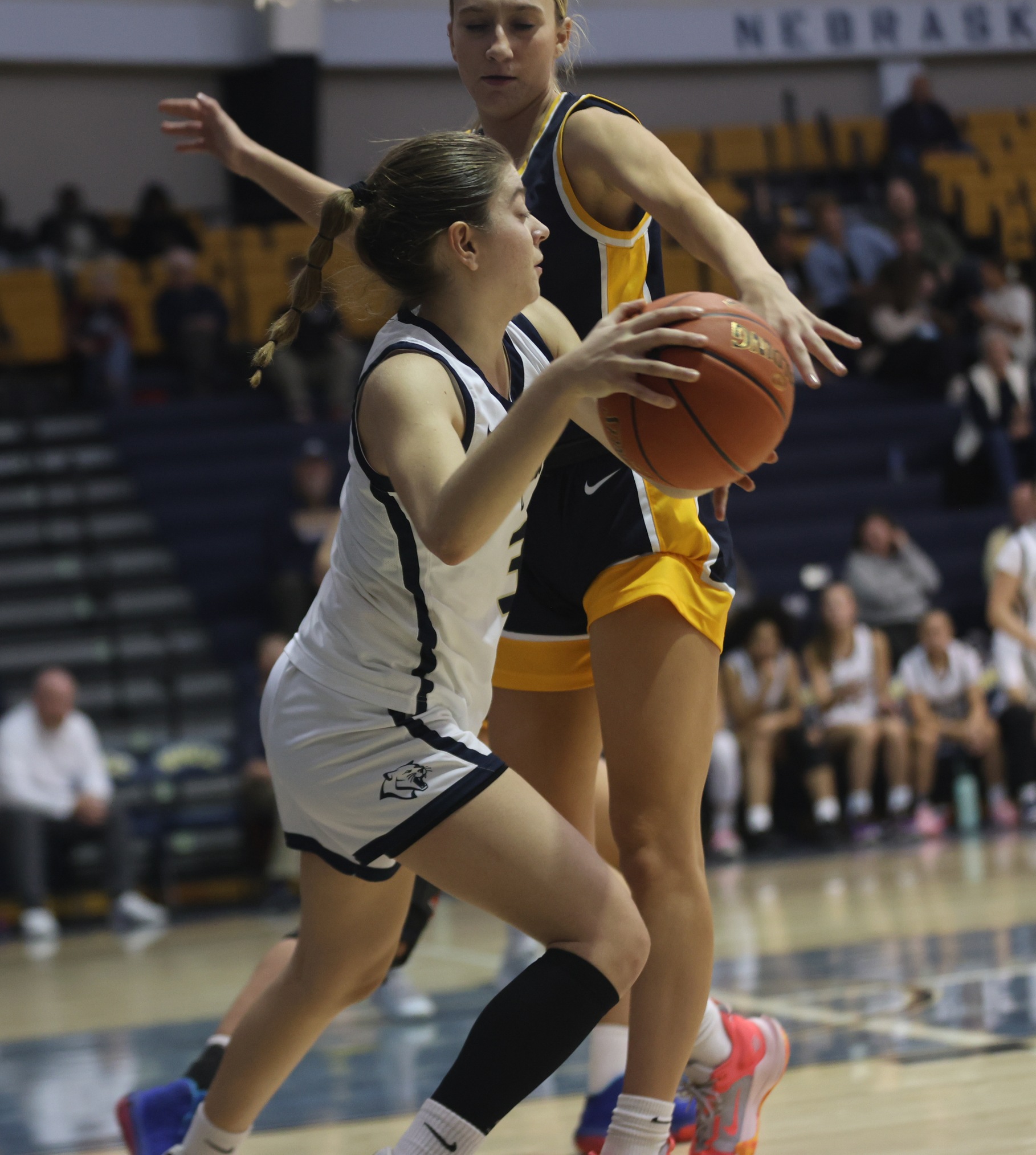 WNCC's Lidia Hernandez looks to pass the ball during their game with LCCC on Friday in the Fairfield Inn Cougar Classic.