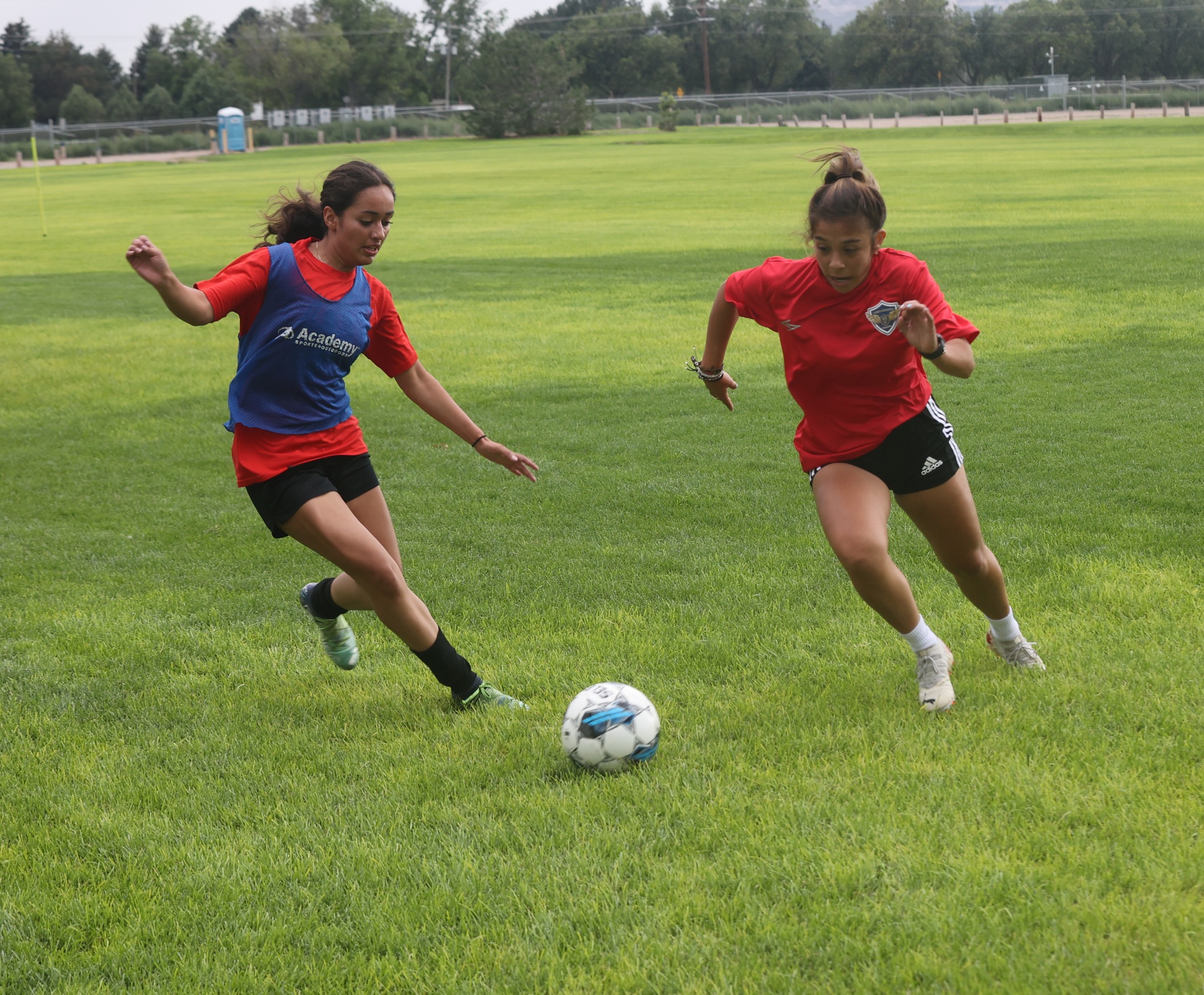 Two players go for the ball during a practice last week.